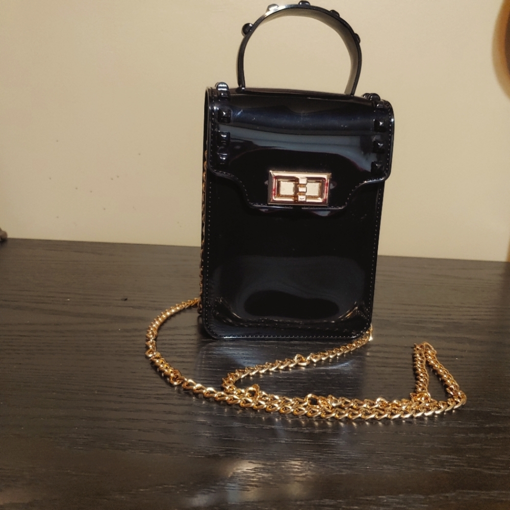 Box style cross body purse with gold chain strap